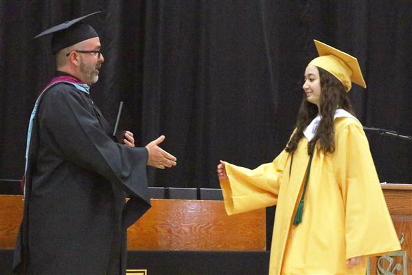Senior Madeline Allen receives her diploma at Commencement