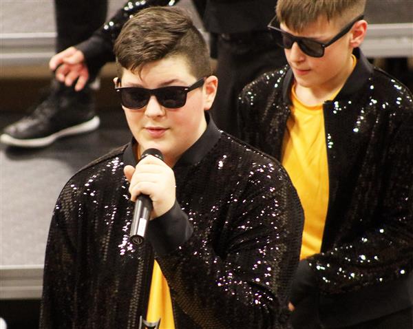 Cole Wendt, shown performing with the junior high schow choir, was selected for New Score as a freshman.