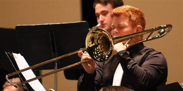  Blake Osteen plays a trombone solo during the Spring Concert