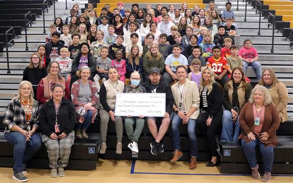  SMS students and staff with Christopher Gutierrez and his family