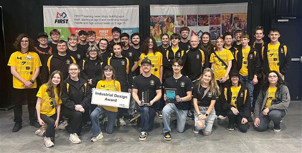  Team SCREAM members pause for a photo after the team was awarded the Industrial Design Award.